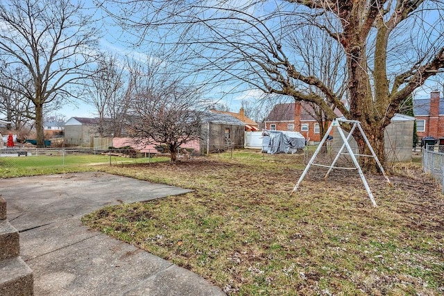 view of yard featuring a patio area and fence