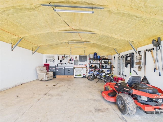 garage featuring a workshop area