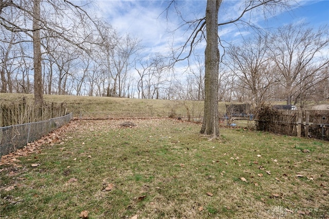 view of yard with fence