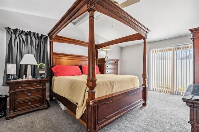 carpeted bedroom featuring access to outside, ceiling fan, and vaulted ceiling