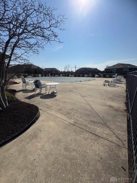 view of community with a patio area