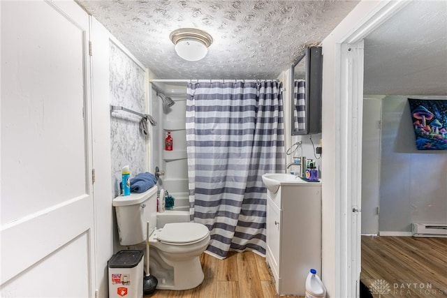 full bathroom with a baseboard radiator, a textured ceiling, wood finished floors, and vanity