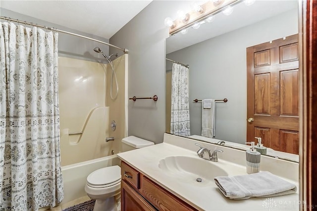 bathroom featuring vanity, shower / tub combo, and toilet