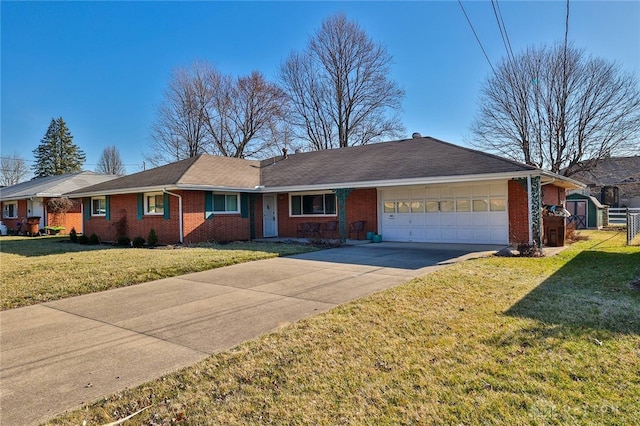 single story home featuring brick siding, a garage, concrete driveway, and a front yard