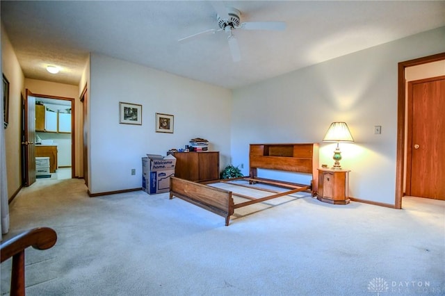 carpeted bedroom featuring baseboards