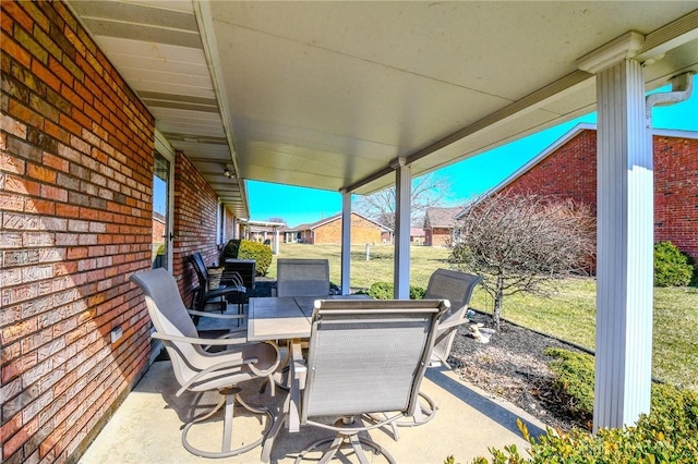 view of patio with outdoor dining area