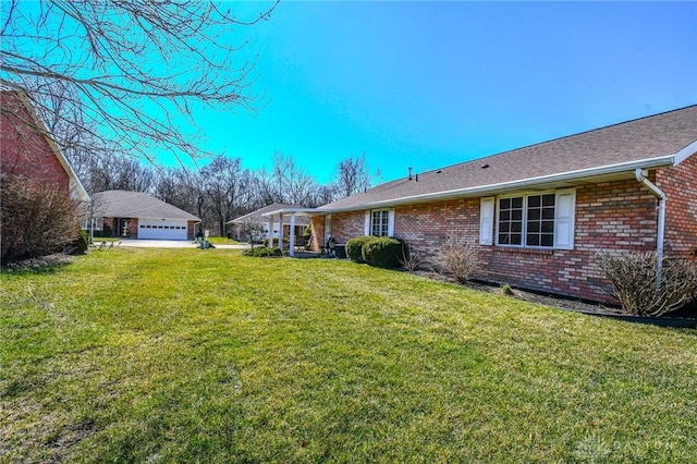 view of yard featuring a garage