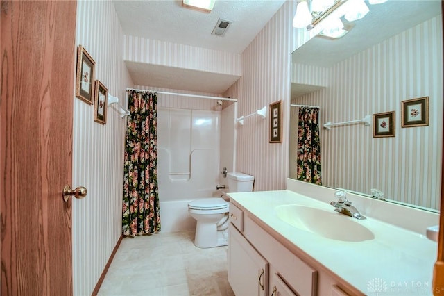 bathroom featuring wallpapered walls, toilet, vanity, and visible vents