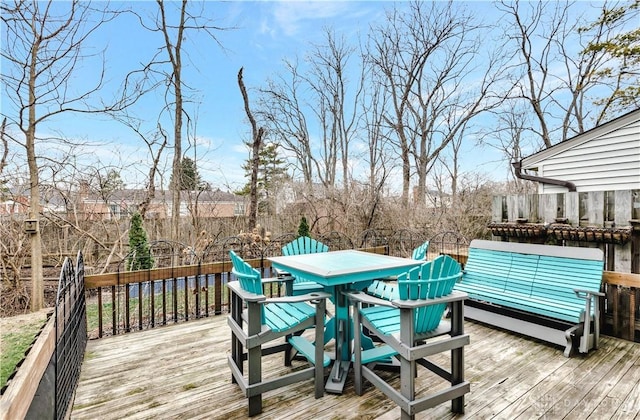 deck with outdoor dining space