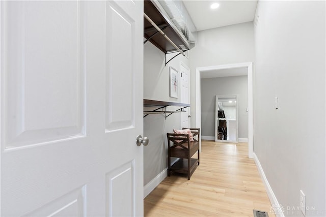 spacious closet featuring visible vents and light wood finished floors