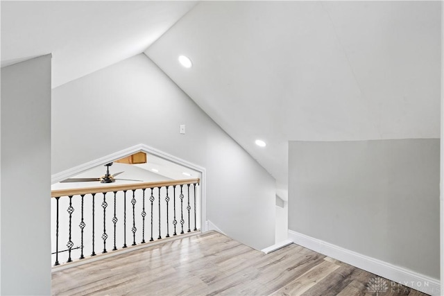 bonus room with wood finished floors, baseboards, recessed lighting, ceiling fan, and vaulted ceiling