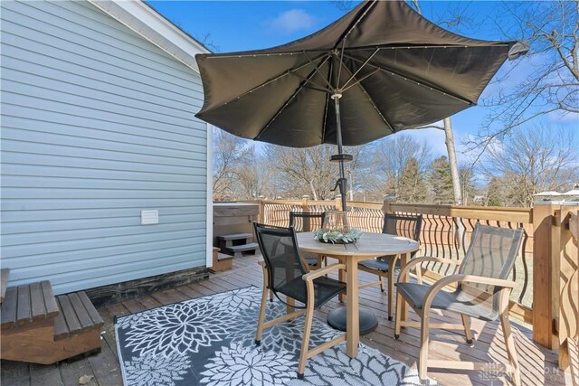 deck with outdoor dining space