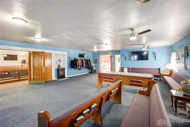 game room featuring carpet and ceiling fan