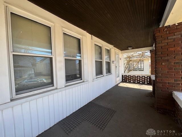 view of patio featuring a porch