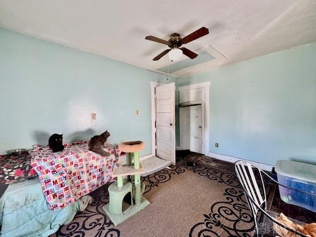 bedroom featuring carpet flooring, baseboards, and ceiling fan