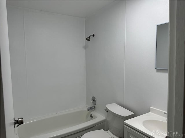 bathroom with toilet, vanity, and bathtub / shower combination