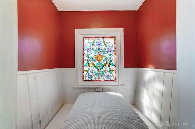 bedroom with wainscoting