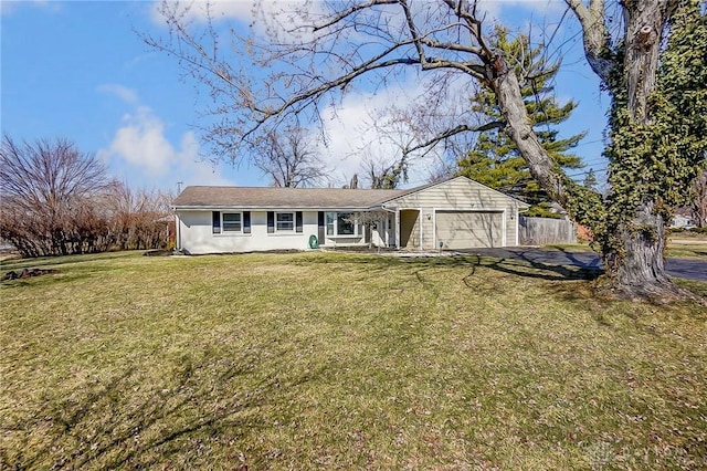 single story home featuring driveway, an attached garage, a front lawn, and fence