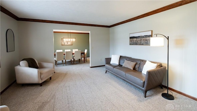 living area featuring a notable chandelier, ornamental molding, baseboards, and light carpet