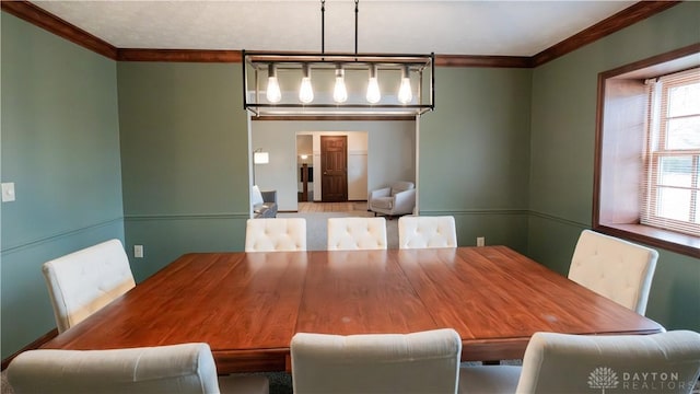 dining room with ornamental molding