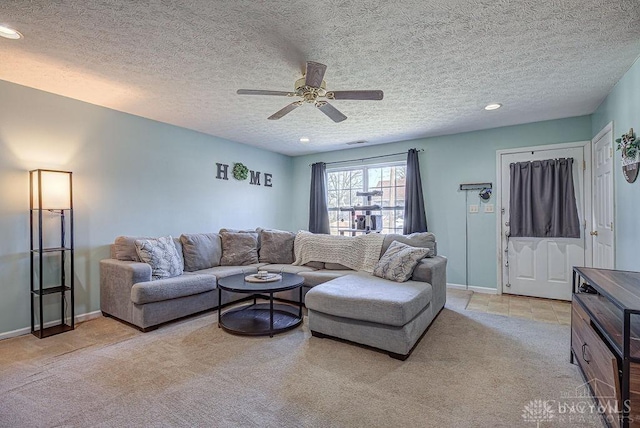 living area with recessed lighting, baseboards, light colored carpet, and ceiling fan