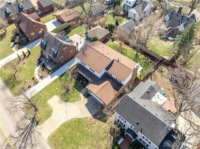 birds eye view of property with a residential view