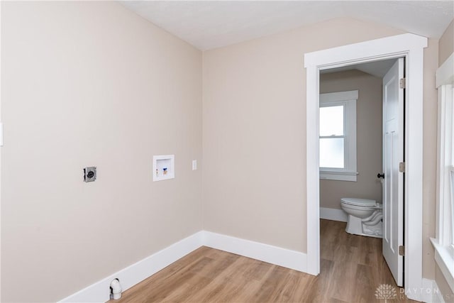 2724 Whittier Ave, Dayton, OH 45420 - laundry room with laundry area, hookup for a washing machine, light wood-type flooring, hookup for an electric dryer, and baseboards