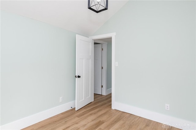 2724 Whittier Ave, Dayton, OH 45420 - unfurnished room featuring baseboards, light wood-type flooring, and vaulted ceiling
