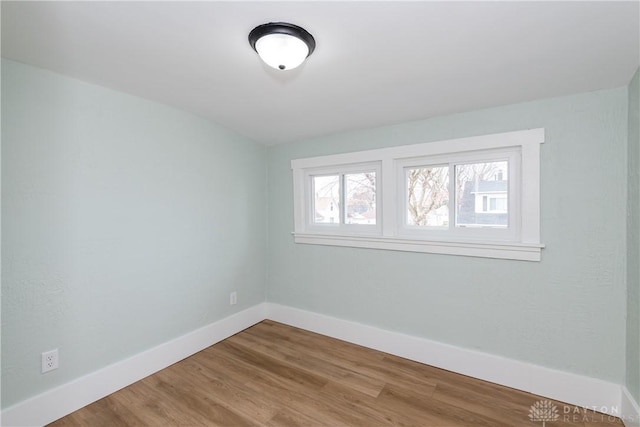 2724 Whittier Ave, Dayton, OH 45420 - unfurnished room featuring baseboards and wood finished floors