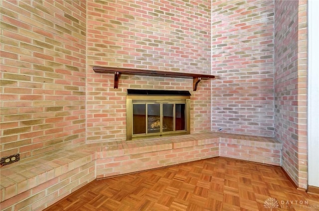 room details featuring a brick fireplace