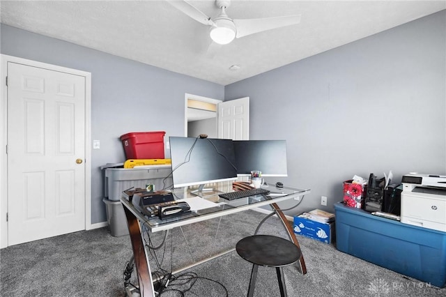 carpeted home office with ceiling fan