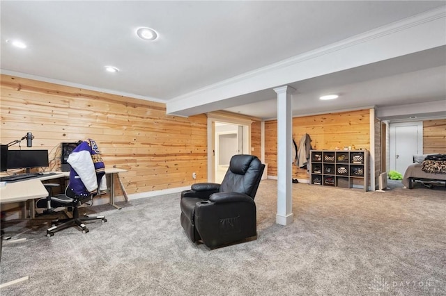 carpeted home office featuring recessed lighting, wood walls, and ornamental molding