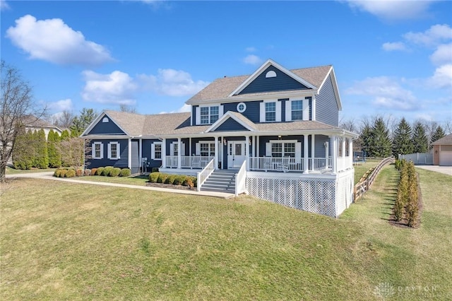 view of front of house with covered porch and a front yard