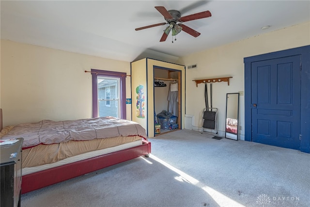 unfurnished bedroom with a closet, visible vents, a ceiling fan, and carpet