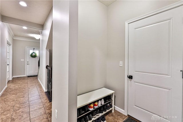 mudroom featuring recessed lighting and baseboards