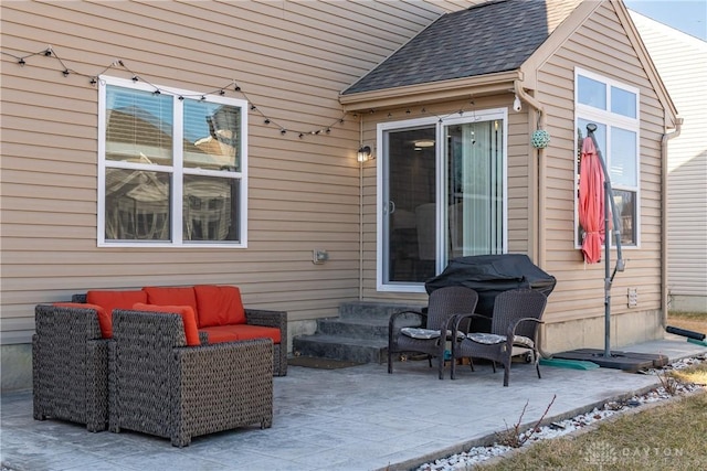 view of patio / terrace with a grill and entry steps