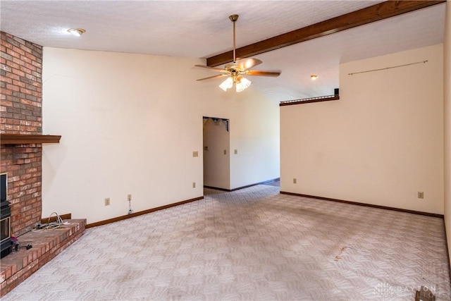 unfurnished living room featuring carpet, lofted ceiling with beams, a ceiling fan, and baseboards