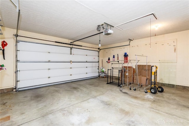 garage featuring a garage door opener