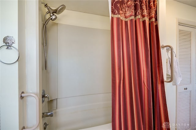 bathroom featuring shower / bath combo with shower curtain