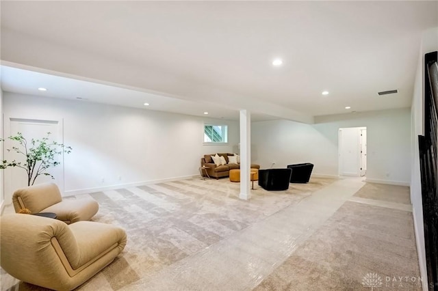 interior space with recessed lighting, light colored carpet, visible vents, and baseboards