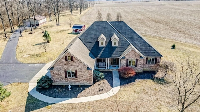 view of front of home with brick siding