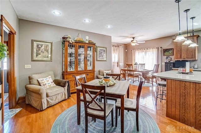 dining area featuring recessed lighting, light wood-type flooring, and ceiling fan