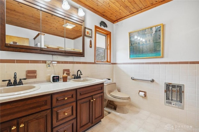 full bathroom with toilet, wooden ceiling, heating unit, and a sink