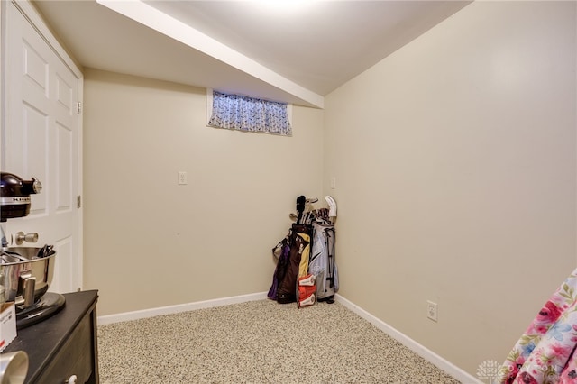 interior space featuring baseboards