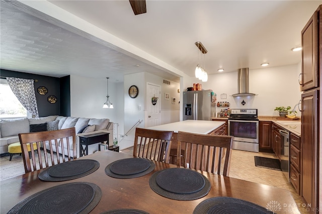 dining area with visible vents and light tile patterned flooring