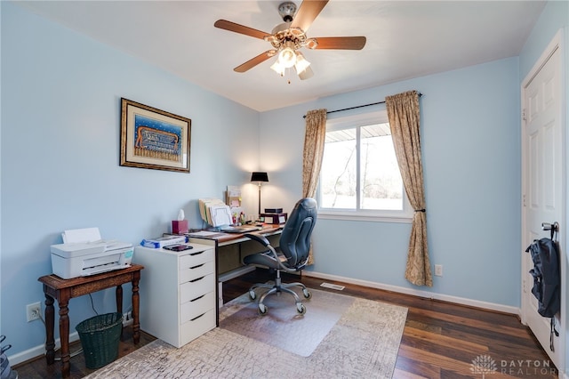 office with a ceiling fan, baseboards, and wood finished floors