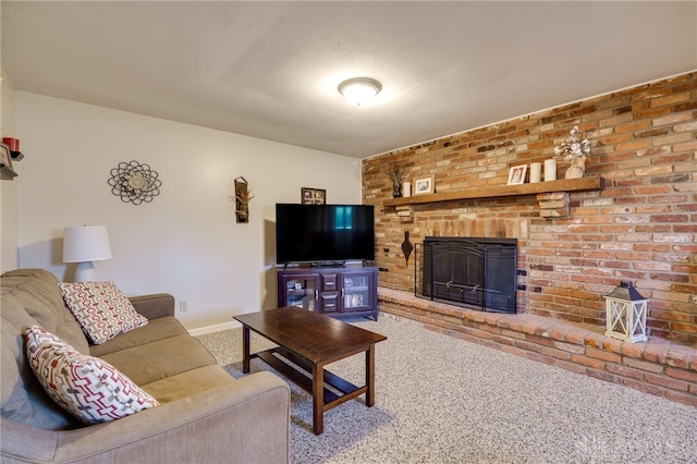 carpeted living area with baseboards and a brick fireplace