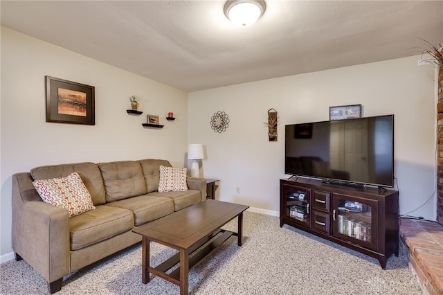 living room featuring baseboards and carpet floors