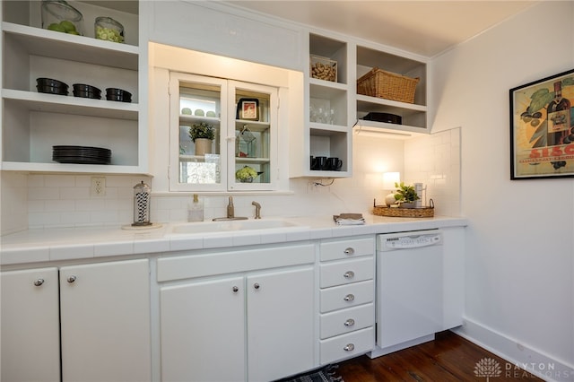 kitchen with backsplash, open shelves, dishwasher, white cabinetry, and a sink