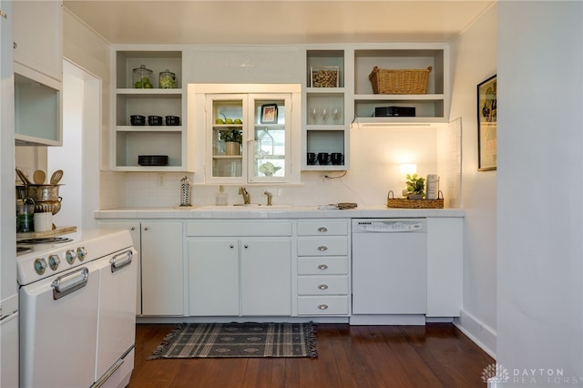 kitchen with open shelves, white appliances, dark wood-style flooring, and tile countertops